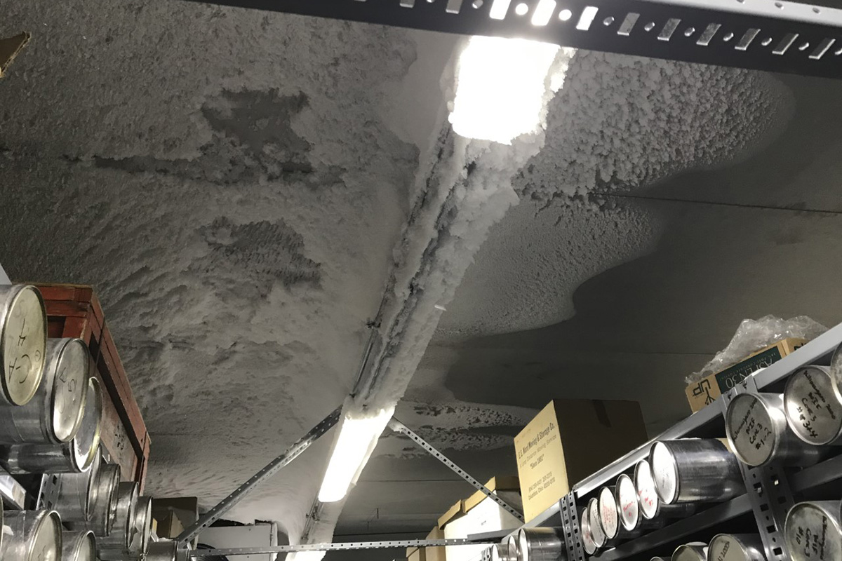 Frost build up on the ceiling of the Ice Core Freezer caused by warm, moist air leaking into the freezer.