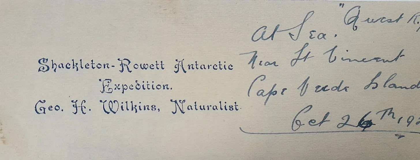 Close-up of a printed and handwritten note on aged paper.