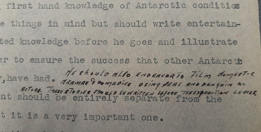 Typed page with a handwritten note inserted between lines