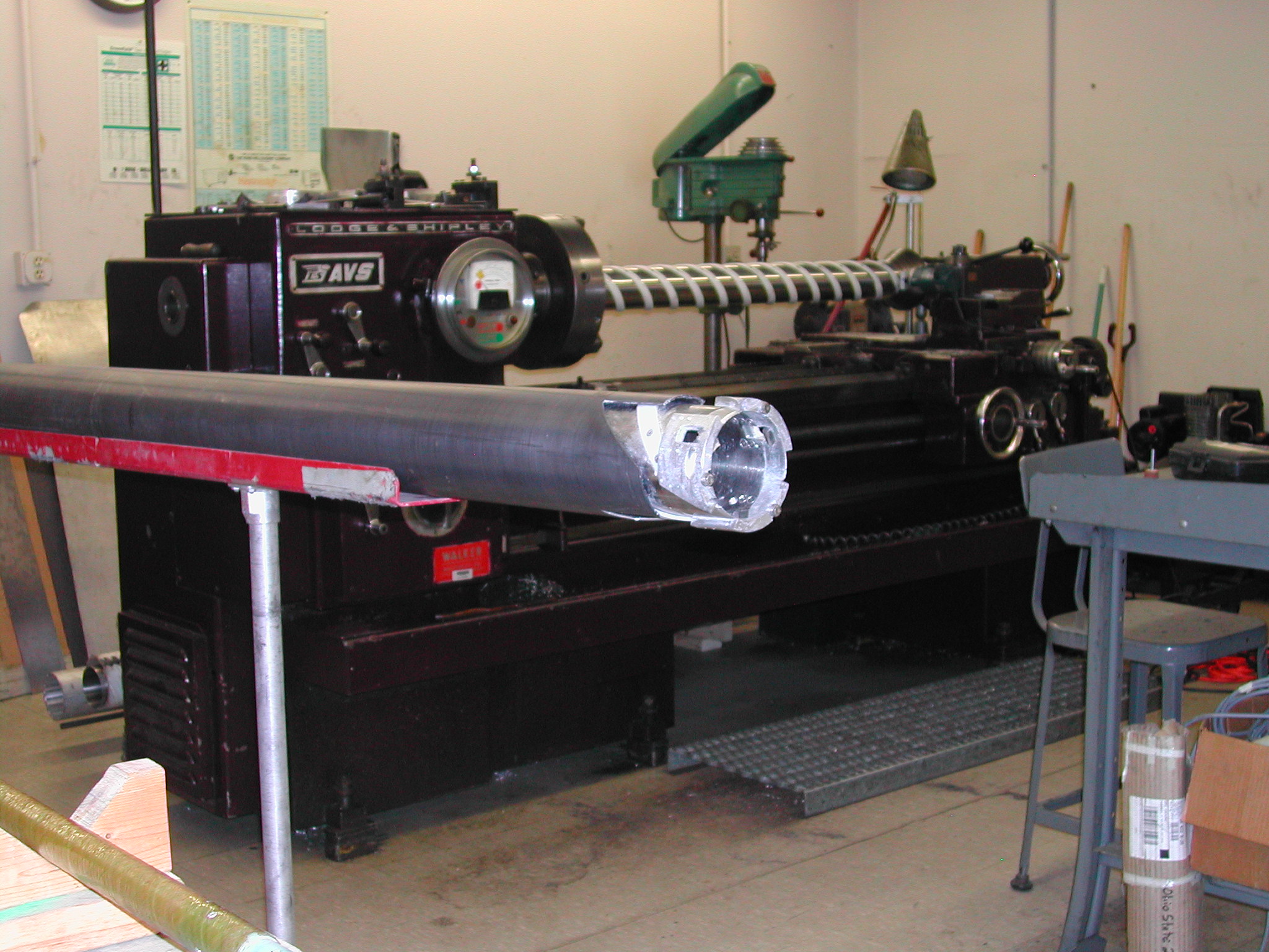 Ice Core Machine shop located in the Byrd Polar and Climate Research Center. An ice core is resting on a stand in the shop 