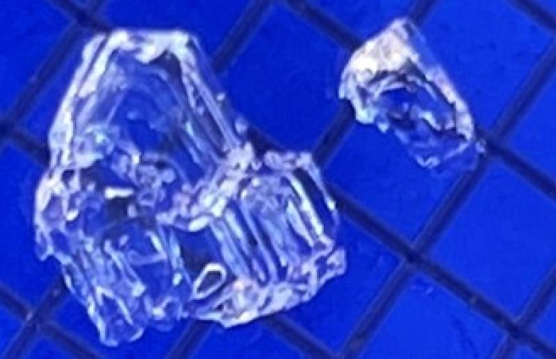depth hoar snow crystals from a snowpit in front of 2 mm grid