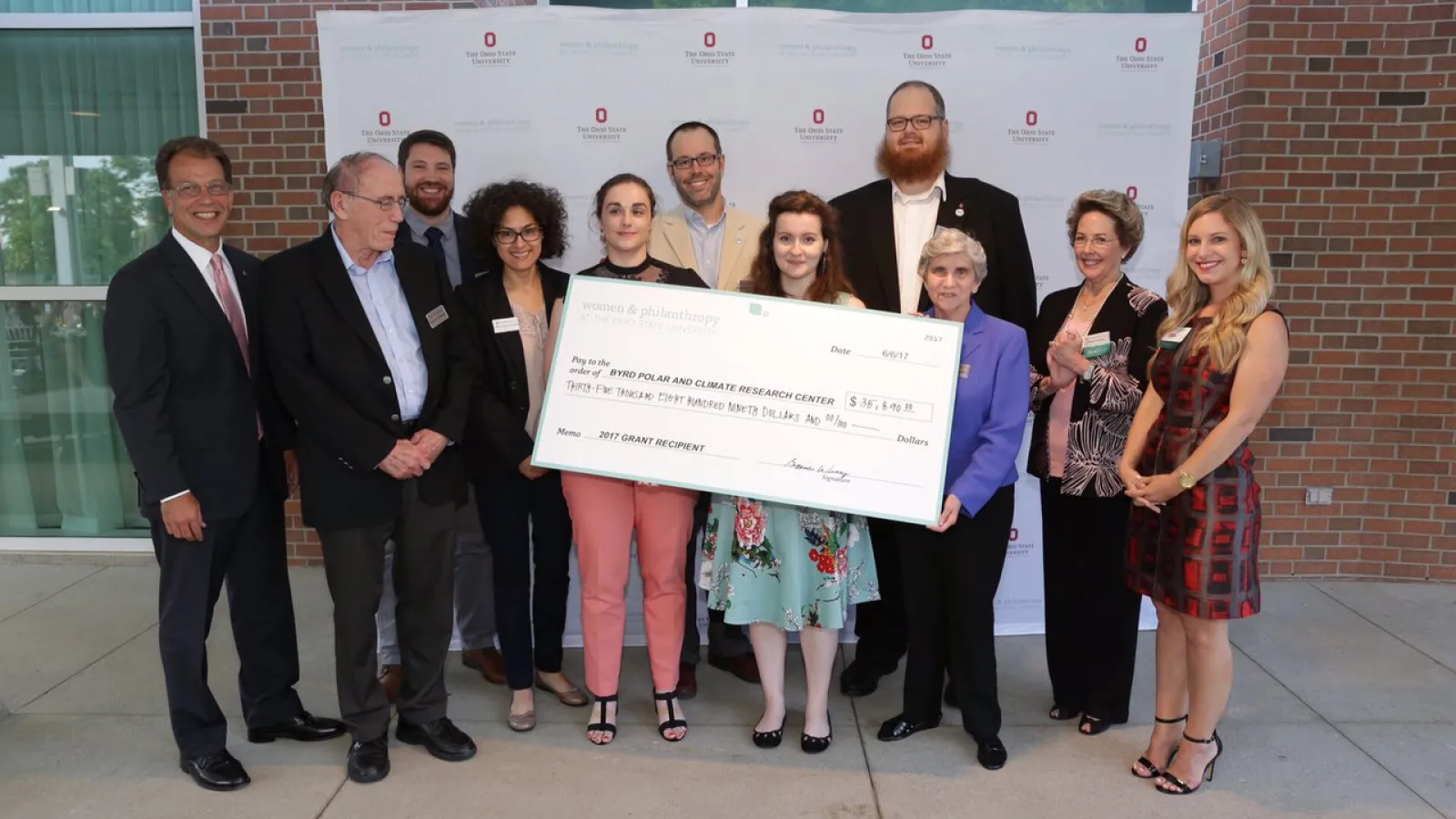 Byrd Center outreach team receiving the award check