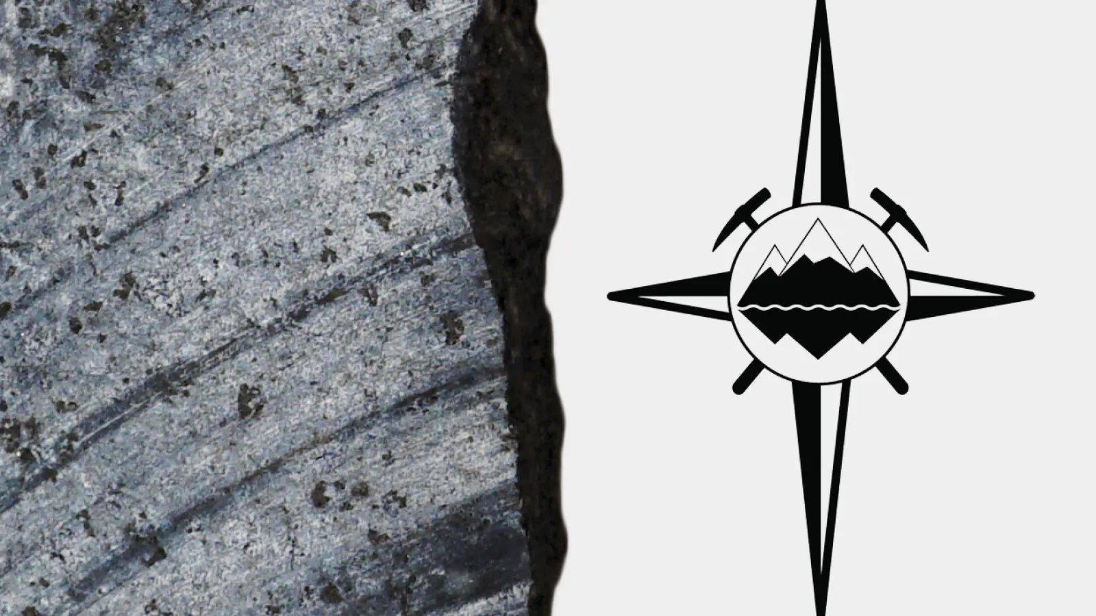 Close-up of sedimentary rock showing distinct layers alongside a logo. The logo is a compass rose with a small set of mountains and two pickaxes at its center.