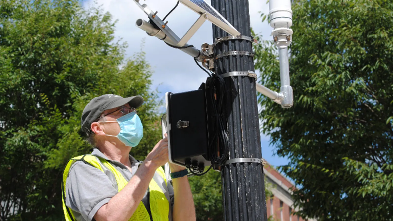 Jim DeGrand installs sensors around the OSU campus.