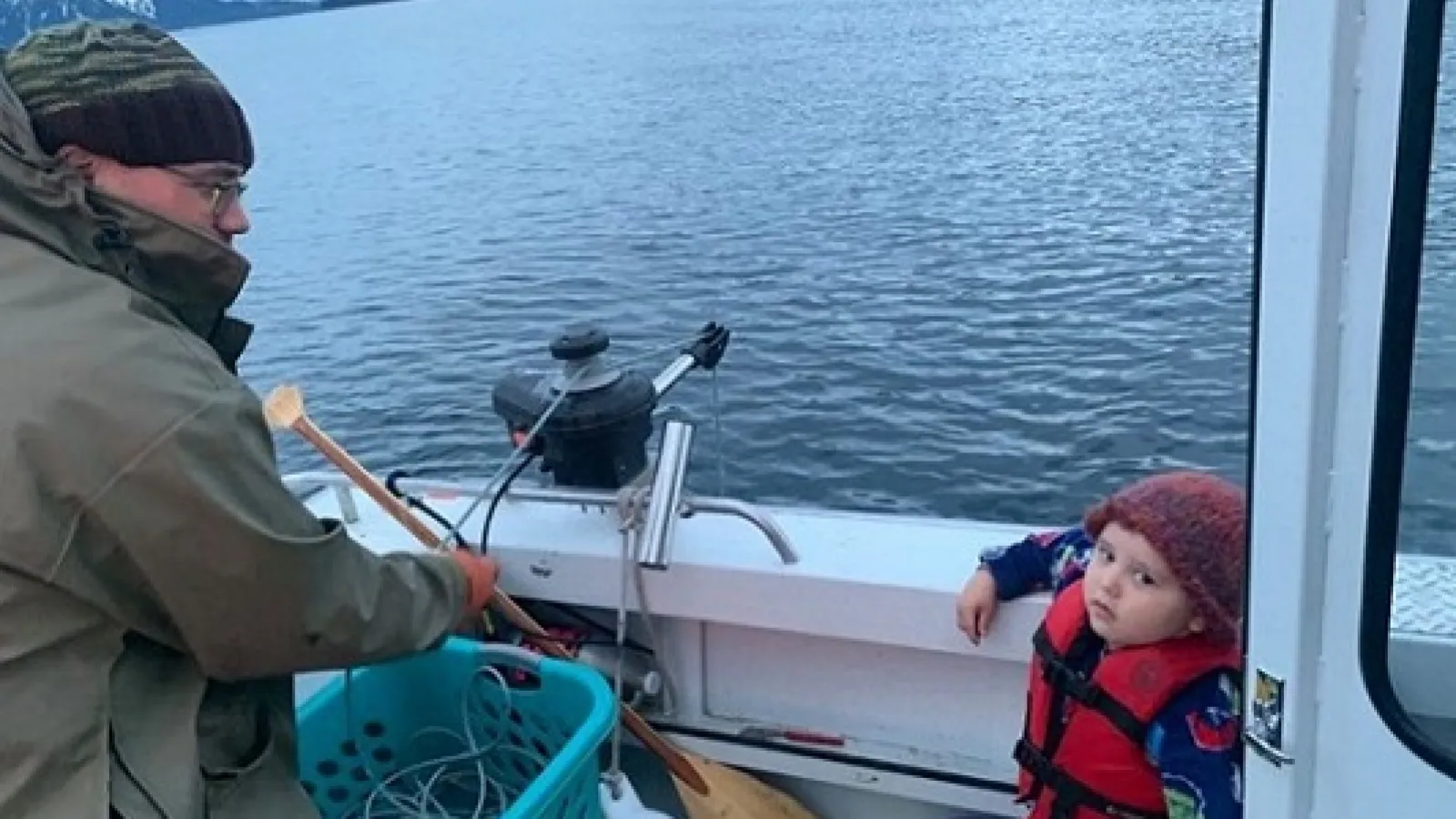 Kaare Erickson and his son while shrimp fishing