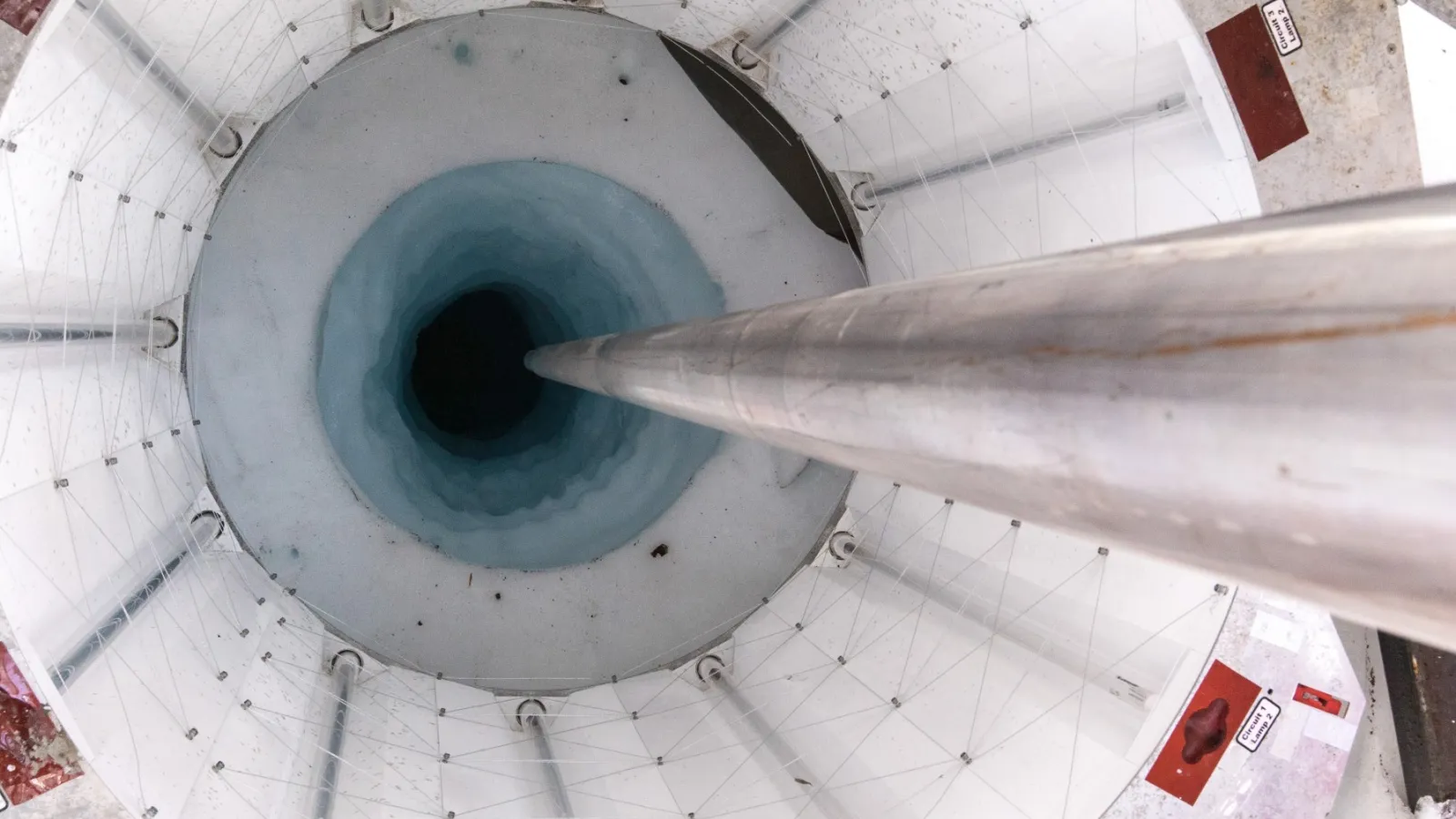 A UV collar protects the borehole and water below from contamination during drilling at Mercer Subglacial Lake Antarctica. Photo by Billy Collins, via SALSA.