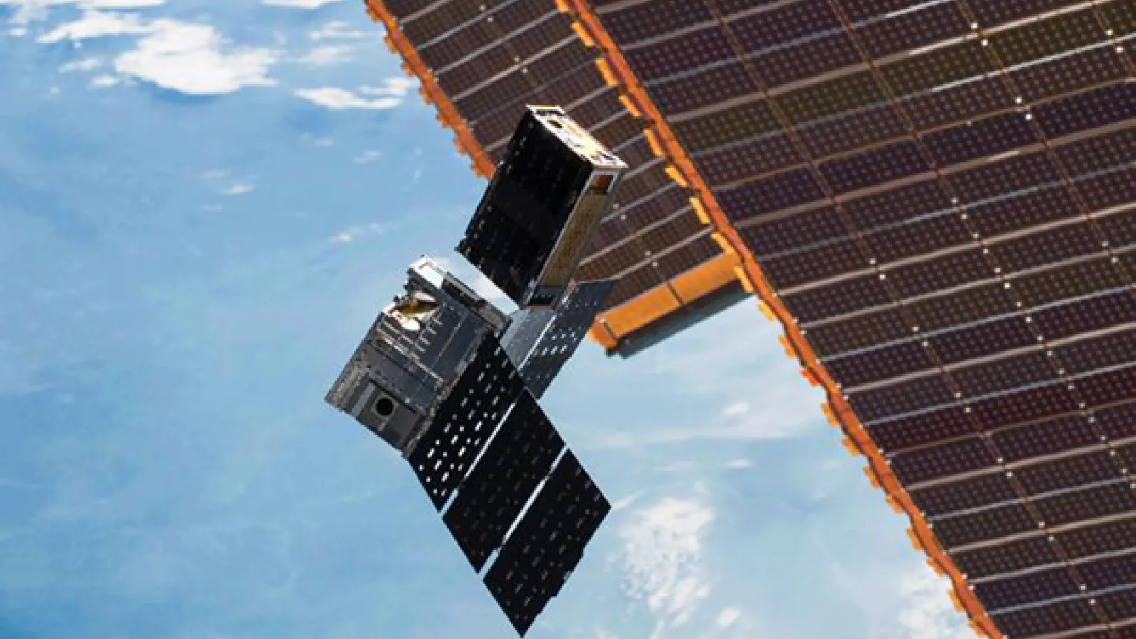 Shoebox-sized CubeRRT satellites being deployed.
