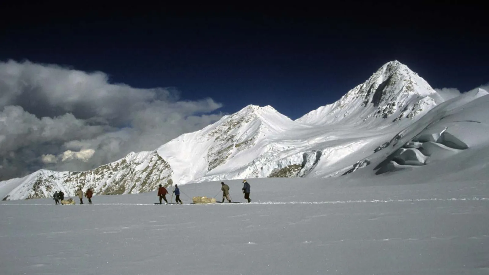 High altitude porters descending equipment and ice cores from the Dasuopu ice core drilling site. Photo credit: Vladimir Mikhalenko