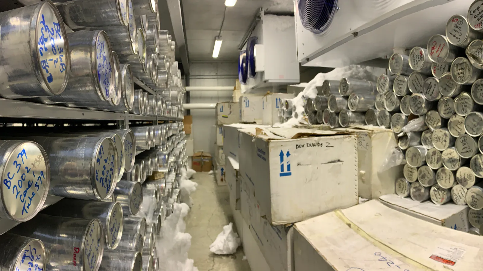 Inside of the Ice Core Freezer showing hundreds of cores crowded together and frost build up due to warm air leaking into the freezer.