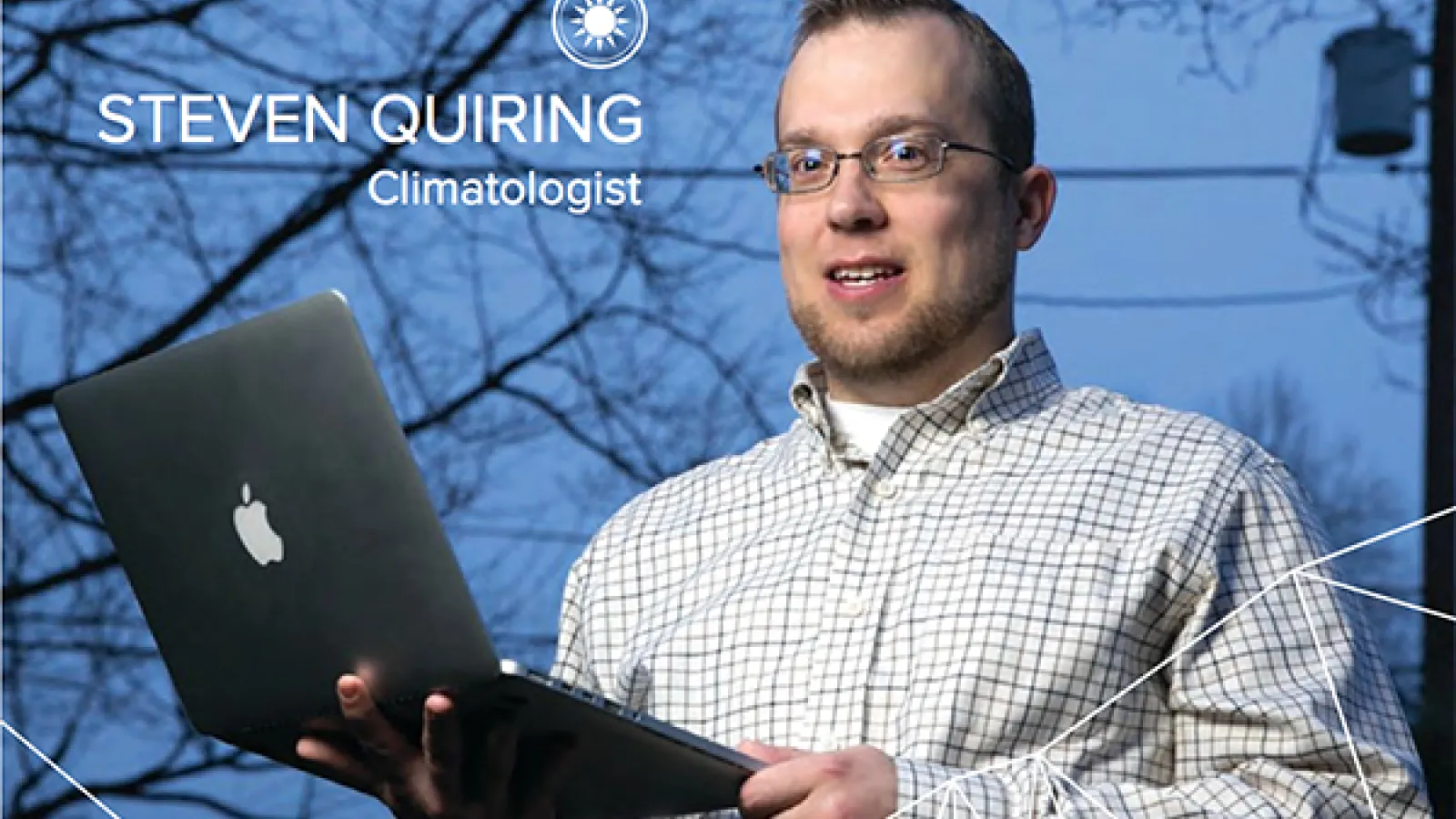 Steven Quiring holding a laptop 