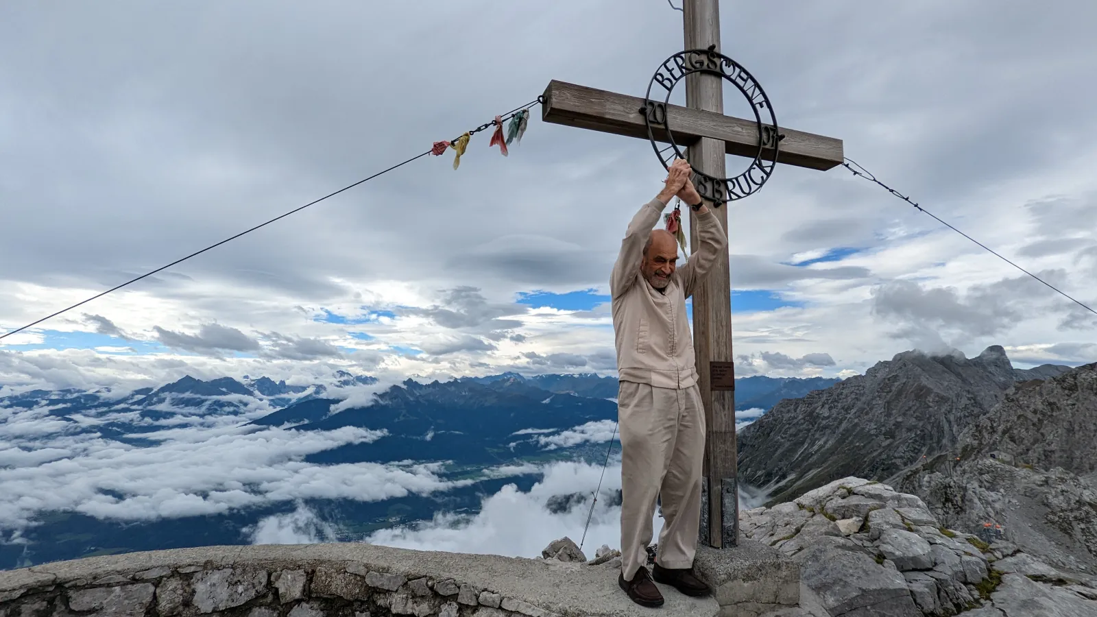 90-year-old Henry Brecher at the Nordkette peak in Innsbruck at 2300 meters above sea level. Image credit to Emily Mazan.