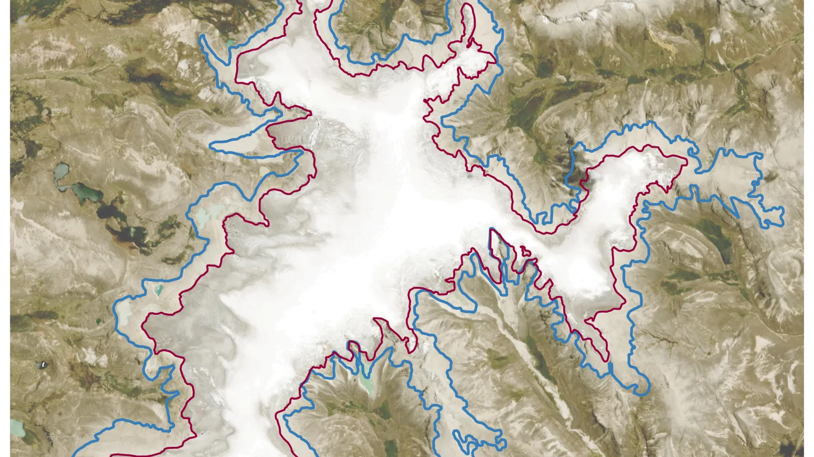 A small map at the top left of the image with the detail insert map as the main map with blue and red lines on a brown and white satellite mage with a legend showing red as 2023 boundary and blue as the 1985 boundary with a north  arrow and a  scale bar at the bottom.