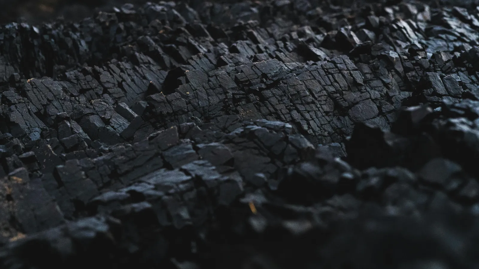 Close-up  of a rock formation like coal. 
