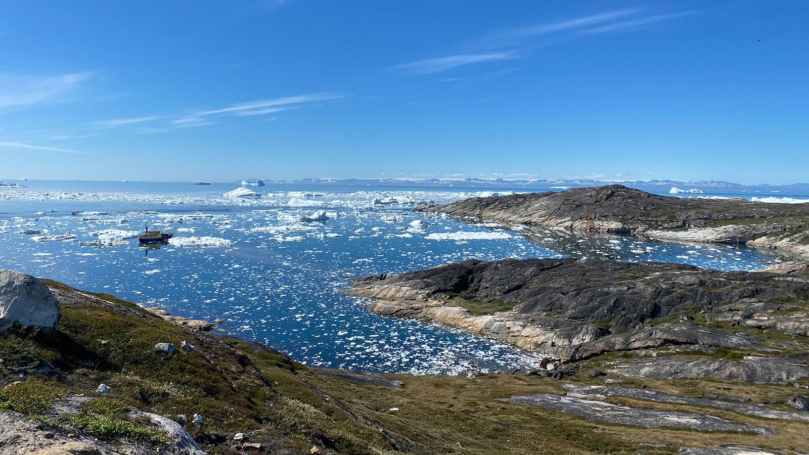 Greenland coast showcasing small glaciers in the water