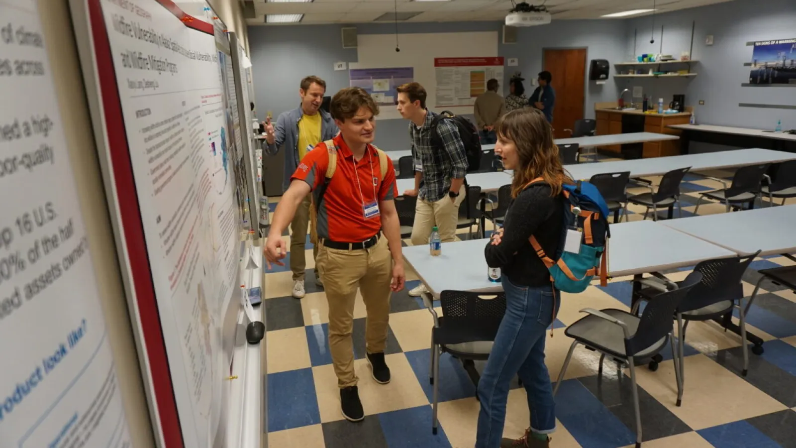 Student presenting a poster at the 2023 Byrd Symposium