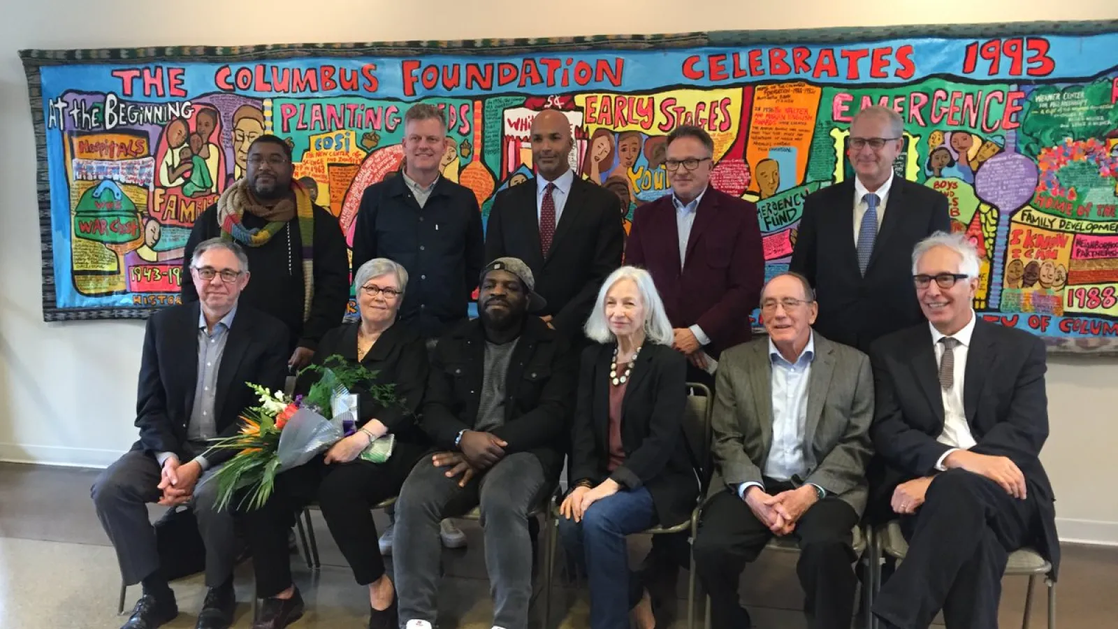 Lonnie Thompson seated with 10 other True Originals