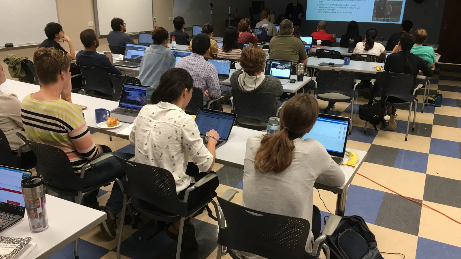 Classroom full of individuals learning to use ICESat-2
