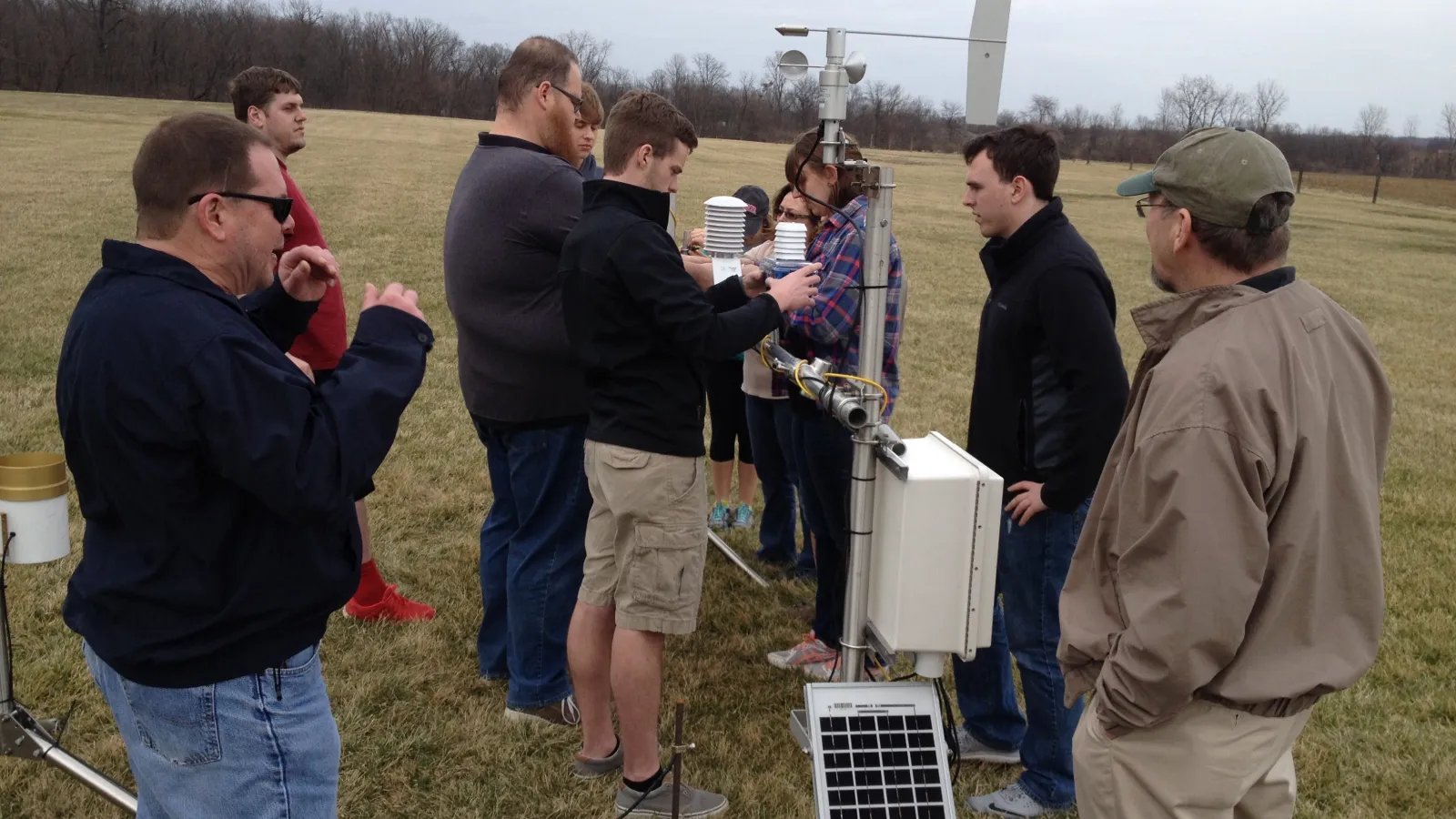 Students and instructors deploying sensors