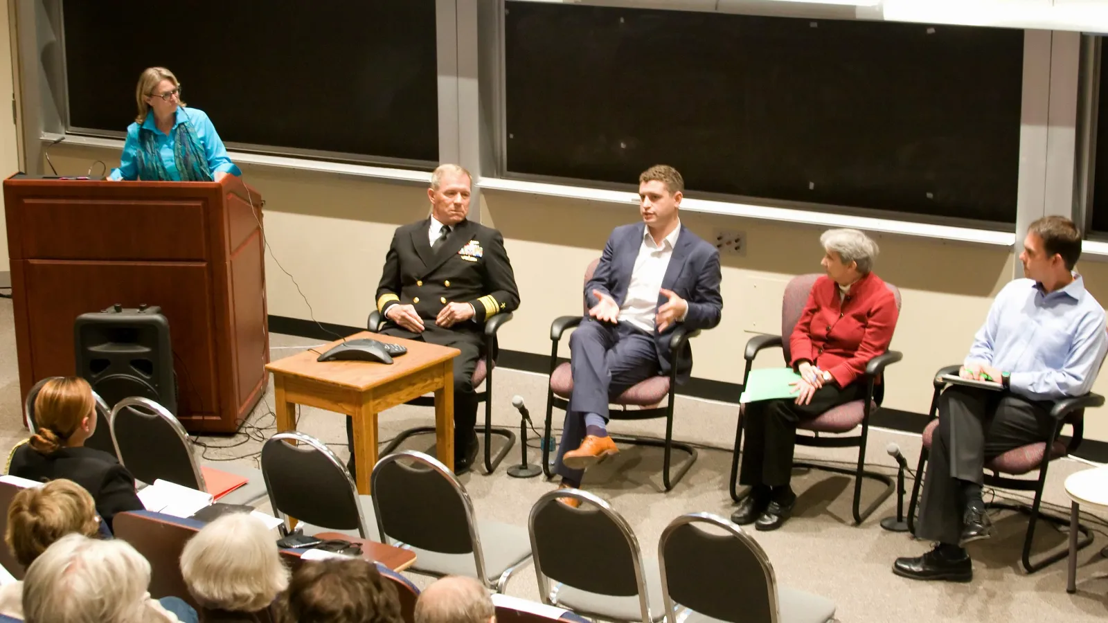 Panelists respond to questions in the auditorium. 