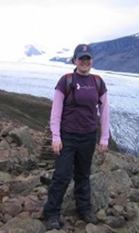 Kaitlin Walsh in front of a glacier.