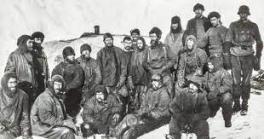 Black and white photo of a Group posing for the image.