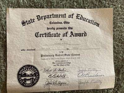 An award from the Ohio State Department of Education awarding Susannah first place in physics in the preliminary district state contest.