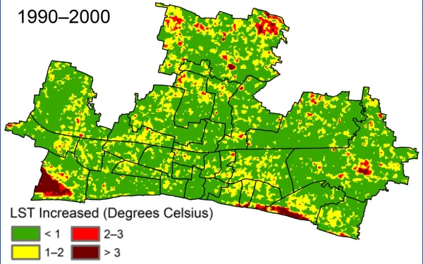 Colorful map with mostly green patches and some yellow, brown and red. with a legend for the colors and dates 1990-2000.