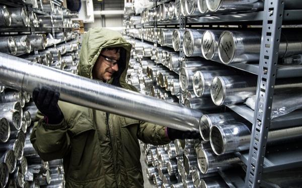A Byrd Center researcher pulls an ice core for analysis.