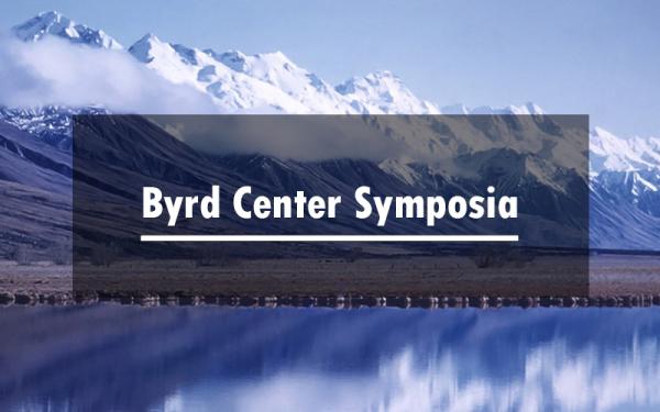 A snow covered mountain and a reflective, glimmering lake beneath it. Overtop of this is the text "Byrd Center Symposia"