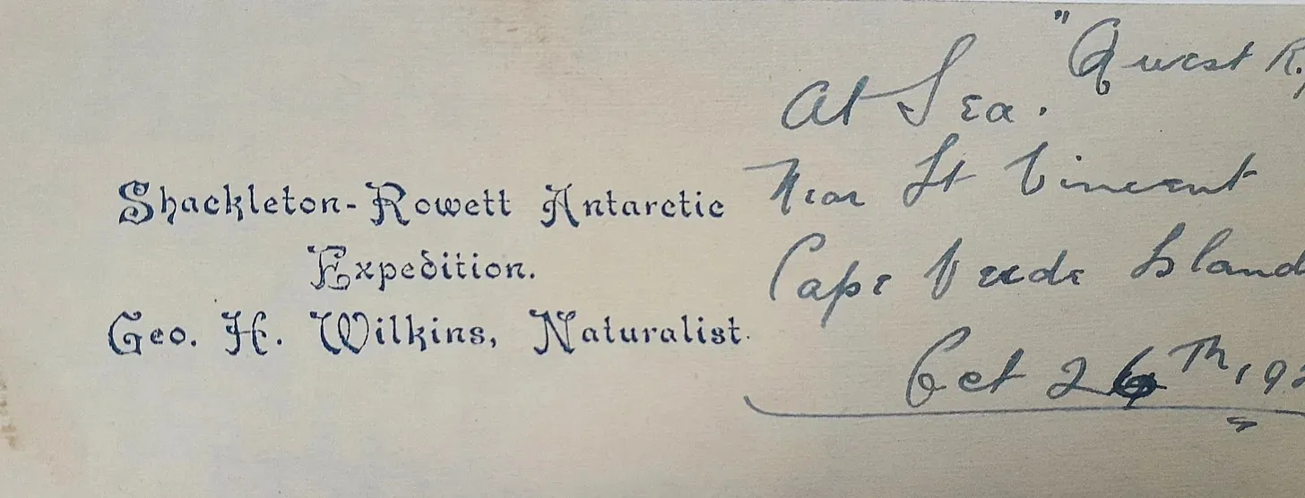 Close-up of a printed and handwritten note on aged paper.