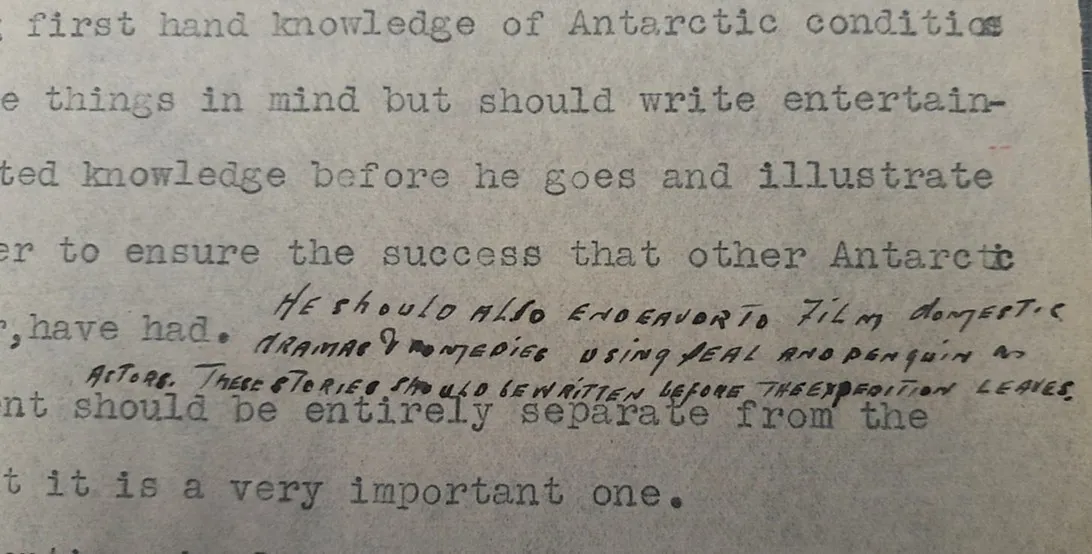 Typed page with a handwritten note inserted between lines