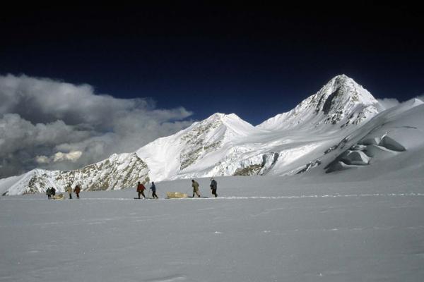 High altitude porters descending equipment and ice cores from the Dasuopu ice core drilling site. Photo credit: Vladimir Mikhalenko