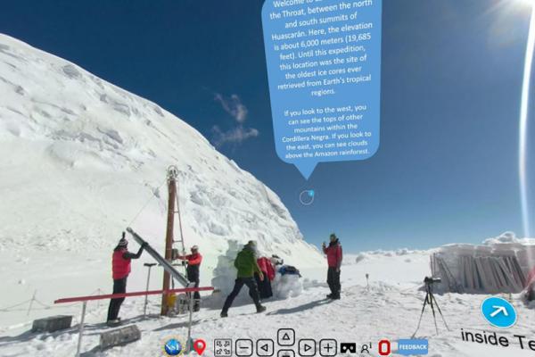 Researchers set up field technology beside a glacier with a blue world cloud above their heads