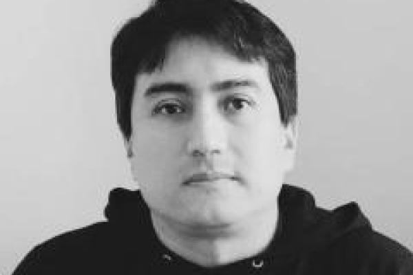 black and white headshot of gustavo