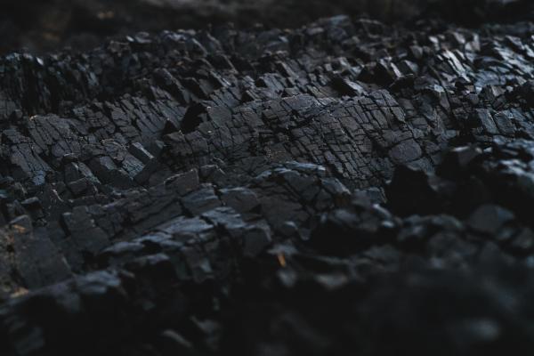 Close-up of a rock formation like coal.