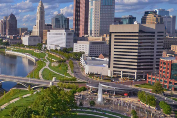 Columbus Climate Adaption Plan Cover Page Aerial view of downtown Columbus along the Scioto River