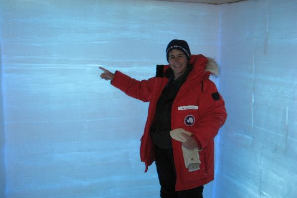 Dr. Julie Palais in the backlit snowpit at WAIS Divide. Photo: Dr. Julie Palais, National Science Foundation