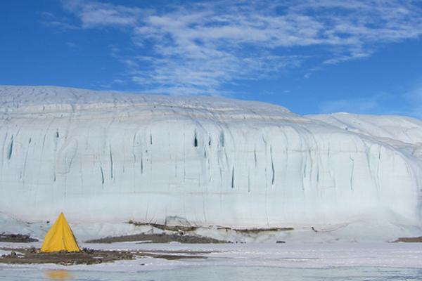Tent in Antarctica Tent Adjacent to Frozen Lake in Antarctica