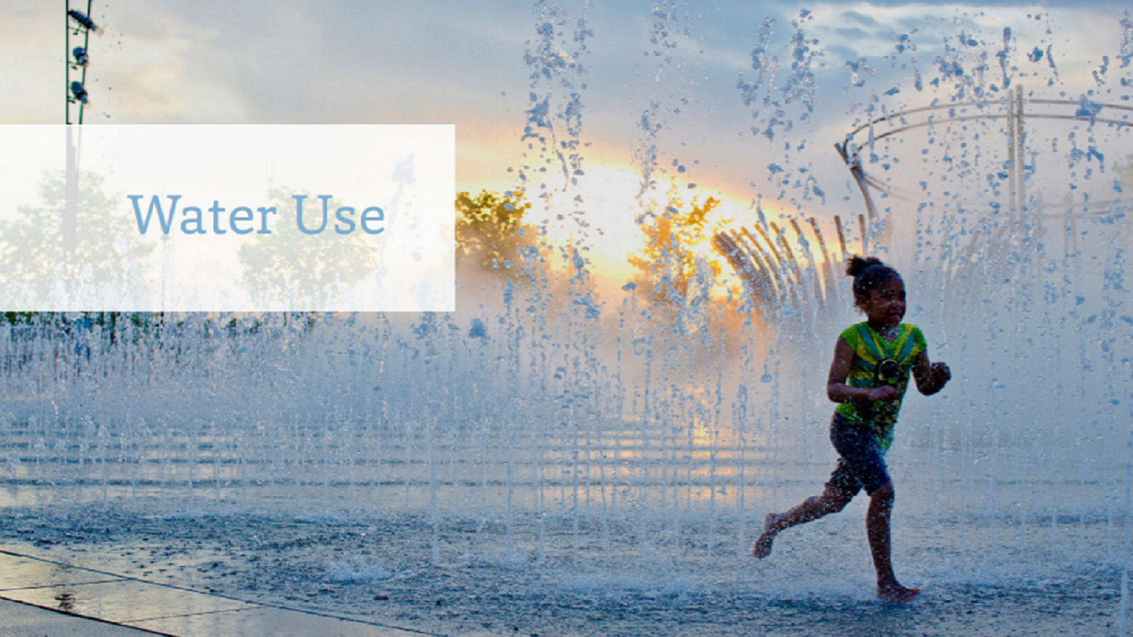 Child running through fountain with the text 'Water Use'