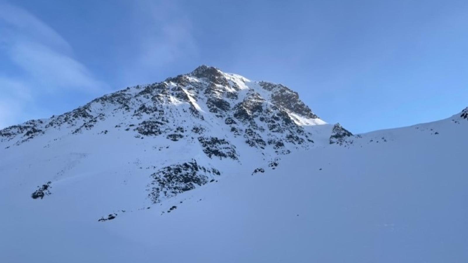  Snow covered mountain with blue skies 