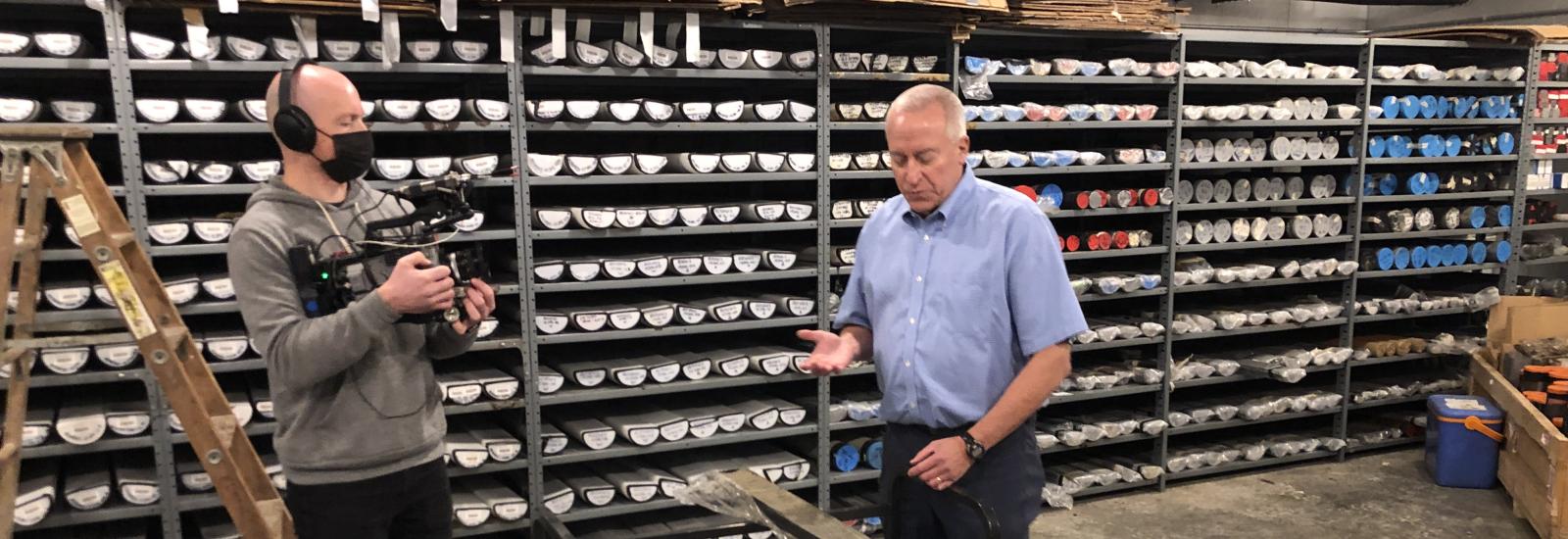 recording a video inside the sediment core facility with cores in the background