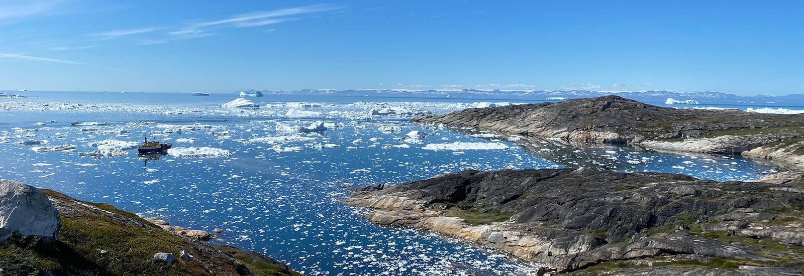 Greenland coast showcasing small glaciers in the water