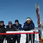 Field team with ice core. Greenland, 2007.