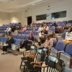 An audience in the auditorium.