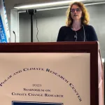 A person speaking a the podium.