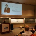 Karina Peggau at the podium.