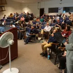 An audience in the auditorium.