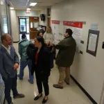 People talking during poster session.