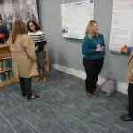 People talking during poster session.