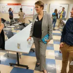 People talking during poster session.